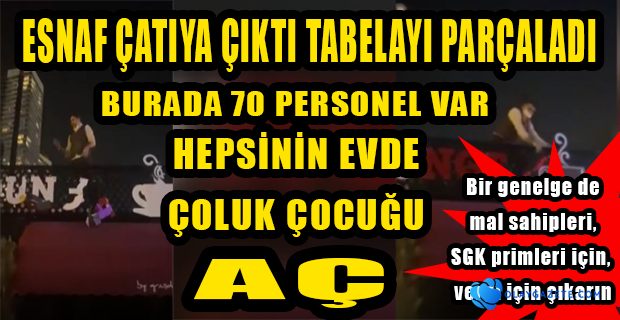 70 KİŞİNİN ÇALIŞTIĞI BİR KAFENİN SAHİBİ ÇATIYA ÇIKARAK, İŞ YERİNİN TABELASINI PARÇALADI
